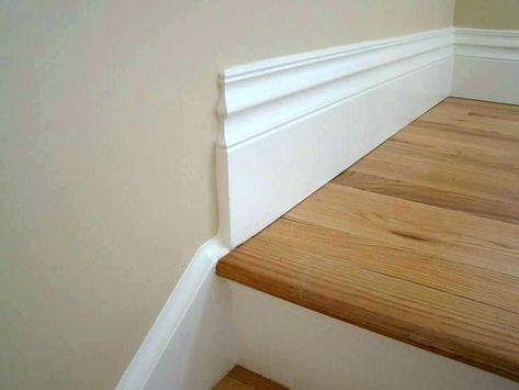 Baseboard Style To Add The Beauty Of Your Home #baseboardstylesmodern Stair Skirt, Baseboard Ideas, Stairs Skirting, Garage Steps, Cove Moulding, Stairs Trim, Modern Baseboards, White Baseboards, Baseboard Styles