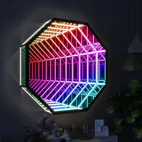 Illuminate your space with the mesmerizing Infinity Mirror Octagonal LED Neon Sign. This captivating piece combines modern design with vibrant LED technology, creating an endless tunnel of light that adds depth and intrigue to any room. Perfect for home decor, game rooms, or commercial spaces, its energy-efficient LEDs ensure long-lasting brilliance. Easy to install and maintain, this neon sign is a stunning focal point that transforms ordinary walls into extraordinary visual experiences. Elevate your ambiance with the Infinity Mirror Octagonal LED Neon Sign and let your decor shine with infinite possibilities. Order now for a touch of futuristic elegance! Led Lights Wall, Futuristic Elegance, Led Infinity Mirror, Neon Signs Quotes, Neon Wall Signs, Infinity Mirror, Visual Illusion, Mirror Led, Love Neon Sign