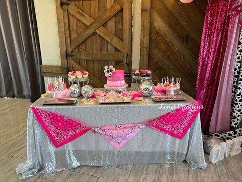 Cute table perfect for a disco cowgirl party! Cowgirl Party Table Setting, Cowgirl Cheer Theme, Cowgirl Disco Table Decor, Pink Cowgirl Table Decor, Cowboy Disco Party Decorations, Cowgirl Disco Centerpiece, Cowgirl Dance Party, Space Cowgirl Birthday Party Ideas, Disco Cowgirl Photo Backdrop