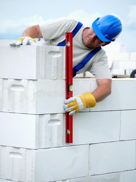 Mason at work. Mason checking plumb line of house wall being made from aerated a , #spon, #plumb, #line, #checking, #Mason, #work #ad Mason Work, Autoclaved Aerated Concrete, Aerated Concrete, Craftsman Style Bungalow, Aac Blocks, Decoration Beton, Concrete Block Walls, Masonry Work, Build A Wall