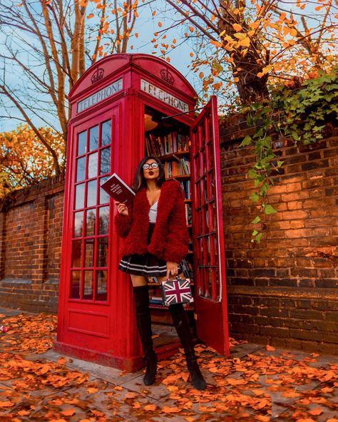 One of London's best kept secrets  This Red Phone Booth that doubles as a Library in Lewisham!   Wearing for the photoshoot:  Red Fluffy Coat and Union Jack bag that are the staples of my autumn style   Autumn Colours in London are so Instagrammable London Red Phone Booth, London Telephone Booth, London Phone Booth, London Photoshoot, Red Phone Booth, Places In London, Brand Photography Inspiration, Telephone Box, Telephone Booth