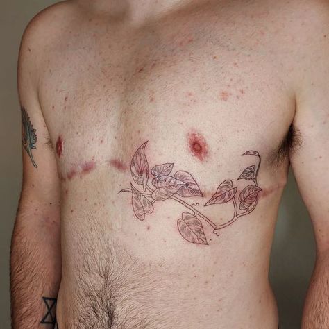 Top Surgery Tattoo Flower, Top Surgery Scar Tatoos, Trans Masc Chest Tattoos, Trans Ftm Tattoo Ideas, Male Pelvic Tattoo, Top Surgery Scar Coverup Tattoo, Post Top Surgery Tattoos, Ftm Scar Tattoo, Top Surgery Ftm Tattoo