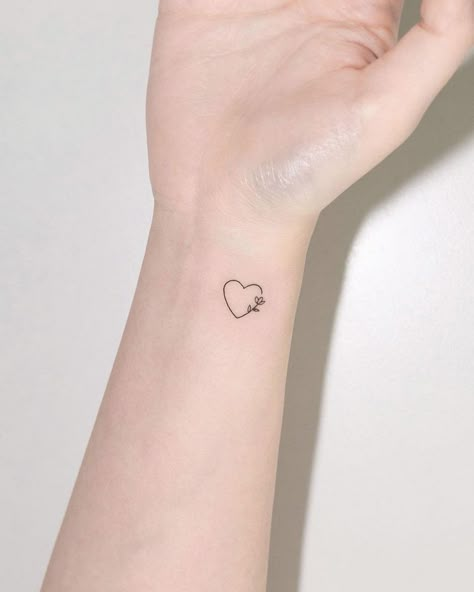 #tattoo, #tattoos, #inked, #tattooart, #tattooedwomen, #tattooedguys, #tattooinspiration, #tattooideas, #tattooworldwide, #tattoosociety, #InkLaughs, and #TattooFails​ Subtle Love Tattoos, Light Gray Tattoos For Women, Less Than 3 Heart Tattoo, Heart With A Tattoo, Subtle Heart Tattoo, Heart With Writing Tattoo, Outlined Heart Tattoo, Modern Heart Tattoo, Simplistic Heart Tattoo