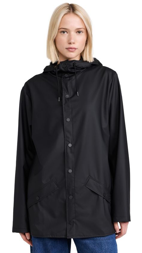 PRICES MAY VARY. WATERPROOF, WINDPROOF, LIGHTWEIGHT AND ENGINEERED VENTILATION: This waterproof jacket for men and women is an ever-contemporary rain jacket delivering high functionality in a minimal silhouette. Features include double welded slanting flap pockets, adjustable cuffs and a fishtail hem. The look is finished with snap fastenings, under-arm eyelets, and a back yoke with concealed vents. FEATURES: A rain jacket for adults featuring snap closure, placket with snap fastenings, drawstri Rubber Raincoats, Scandinavian Aesthetic, Safety Clothing, Rain Jacket Women, Pu Fabric, Jacket For Men, Waterproof Jacket, Rain Wear, Dance Dresses