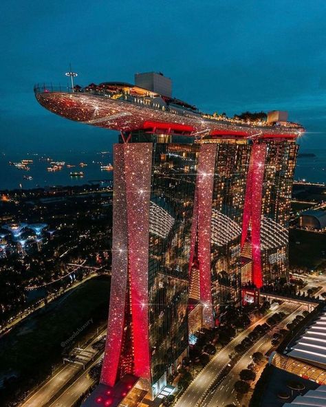 Hoxon on Instagram: “Marina Bay Singapore outshines everything. Would you like to travel to Singapore? Comment below and tag someone you would bring with you!…” Sands Singapore, Singapore Photos, Singapore City, Sands Hotel, Tall Buildings, City At Night, Singapore Travel, Amazing Buildings, Unique Architecture