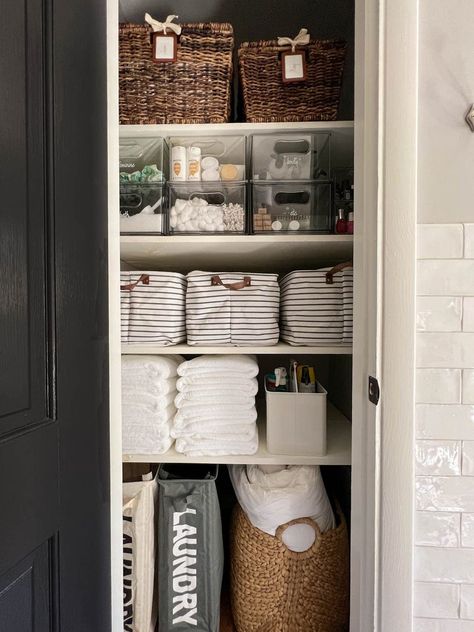 Categorize the Bathroom Closet: Maximize closet space by categorizing, labeling and organizing everything you own. Use large baskets for extra linens, clear bins for toiletries and color-coordinated hampers to make laundry day a breeze. See more at Bless'er House. Bathroom Closet Organization Ideas, Tiny Closet Organization, Hanging Bathroom Shelves, Clever Bathroom Storage, Small Linen Closets, Bathroom Linen Closet, Bathroom Organization Hacks, Bathroom Sink Organization, Bathroom Drawer Organization