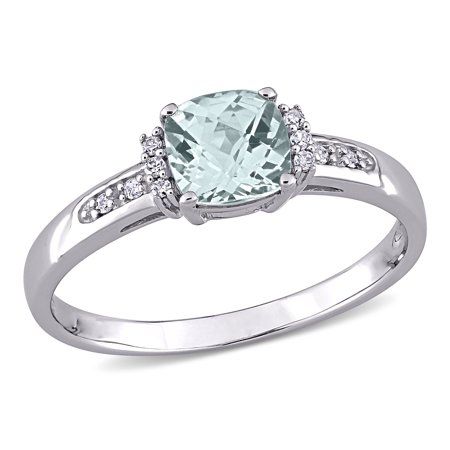 Add a captivating piece to your collection with this Miabella Aquamarine and Diamond Accent Engagement Ring. Mounted in lustrous white gold it features a cushion checkerboard-cut prong-set aquamarine gemstone (6 x 6mm) at the center flanked by ten round-cut pave-set and prong-set diamond accents (G-H, I2-I3). Polished to a brilliant shine, this flawless ring is a must have for every person who loves to accessorize. A timeless ring that will always keep you in vogue. Color: Silver.  Gender: femal Gold Cushion Engagement Ring, Kays Engagement Ring, Cushion Engagement Ring, Timeless Ring, Diamond Promise Rings, White Gold Engagement Ring, Aquamarine Stone, White Gold Engagement, White Gold Engagement Rings