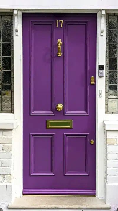 A victorian front door painted purple with luxury brass door furniture Black House Purple Door, Purple Doors Front House, Plum Front Door, Front Doors Painted, Purple Front Door, Front Door Purple, Victorian Front Door, Purple Front Doors, Victorian Doors