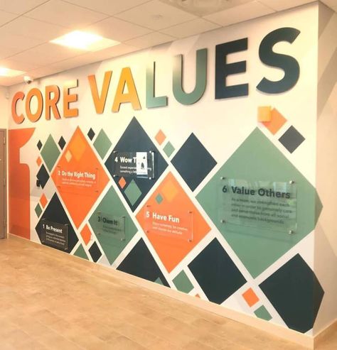 Corporate Wall Design Graphics, Construction Office Wall Design, Mural Office Wall, Core Values Wall Design, Corporate Values Wall, Corporate Wall Mural, Office Mural Ideas, Office Wall Design Ideas Creative, Corporate Wall Design