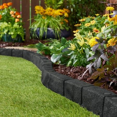 Transform your garden with ease using GroundSmart Cobblestone Rubber Landscape Edging Made of flexible rubber, this edger curves to your landscape for a beautiful finish. Installation is a breeze with the SmartLoc connecting system, results in a seamless fit between edging pieces for a professional look. GroundSmart Cobblestone Landscape Edging is perfect for flower beds, walkways, patios and much more. The no dig installation makes set up simple and hassle-free. Make your landscape stand out with the GroundSmart Cobblestone Landscape Edging. Size: 48" x 3" x 3".  Color: Black. Paver Garden Edging, Garden Edging Stones, Landscape Edging Stone, Garden Lawn Edging, Patio Edging, Garden Border Edging, Flower Bed Edging, Edging Plants, Landscape Borders