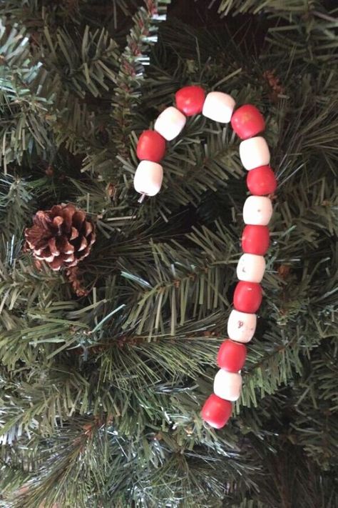 Decorate your Christmas tree in farmhouse style with these cheap and easy candy cane tree ornaments you can make with dollar store beads. Learn how to make these cute dollar tree farmhouse Christmas decor idea on a budget. Dollar Tree Farmhouse Christmas Decor, Candy Cane Tree, Christmas Decor Idea, Dollar Tree Farmhouse, Barn Wall Art, Easy Candy, Easy Fall Wreaths, Mercury Glass Christmas Ornaments, Beads Candy