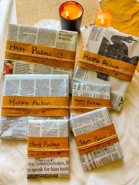 Wrapping With Newspaper, Gift Wrapping Newspaper, Newspaper Packaging Ideas, Newspaper Wrapped Gifts, Newspaper Gift Wrap, Newspaper Gift Wrapping Ideas, Newspaper Gift Wrapping, Newspaper Packaging, Aesthetic Packaging