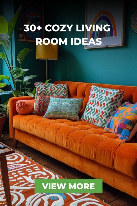 This eclectic living room showcases a bright orange sofa with colorful patterned pillows, set against teal walls. Unique artwork and a mix of textures create a vibrant and cozy space. Contrast Sofas Living Room, Colorful Throw Pillows For Grey Couch, Orange Sofas Living Room Ideas, Mix Sofas Living Rooms, Bright Sofa Living Room, Teal Sofa Living Room Ideas, Orange And Teal Living Room, Teal And Orange Living Room, Orange Sofa Living Room Ideas