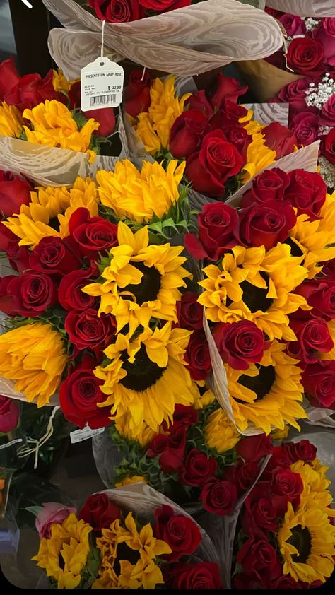 A mix of yellow sunflowers and red roses Sunflower And Rose Aesthetic, Red Yellow Flower Arrangements, Sunflower And Roses Wallpaper Iphone, Sunflower And Rose Wallpaper, Sunflowers And Roses Aesthetic, Sunflower Roses Bouquet, Sunflowers And Roses Wallpaper, Sun Flowers And Roses, Roses And Sunflowers Bouquet