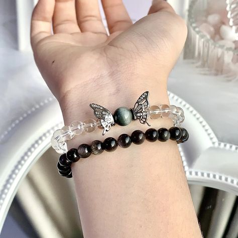 Enhance your style with our mesmerizing Silver Obsidian Butterfly Clear Quartz Bracelet! This elegant accessory boasts an irresistibly eye-catching design, featuring clear quartz and silver obsidian that wraps around two circles on your wrist to form its captivating shape. Silver Obsidian Butterfly Clear Quartz Bracelet Embrace More, Save in Abundance! 💖 🏷️Get any 2 bracelets and enjoy a 5% discount 🏷️️Adorn yourself with any 3 bracelets and enjoy a 10% off! 🏷️Go beyond with any 4 brac... Clear Quartz Bracelet, Arm Candies, Silver Obsidian, Energy Bracelets, Quartz Bracelet, Elegant Accessories, Artisan Craft, Arm Candy, Jewelry Projects