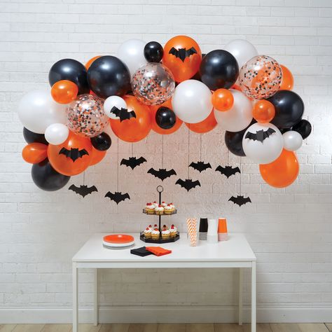 "Buy the Halloween Orange, Black & White Bat Balloon Garland by Celebrate It™ at Michaels. Whether you use this kit to complete your day-of vibes or as a frightful party accent, this will be sure to make a great addition to your spooky season décor. Complete your spooky aesthetic this Halloween with this balloon garland kit from Celebrate It! Whether you use this kit to complete your day-of vibes or as a frightful party accent, this will be sure to make a great addition to your spooky season décor. Pair with our other Halloween pieces to create something really frightening! Details: Bat garland design 8.5\" x 6.5\" (21.59cm x 16.51cm) overall size 43 included balloons Makes 1 balloon garland Latex, plastic, glue, paper and PVC Suitable for indoor use Contents: 12 medium balloons (12\"/30.4 Small Halloween Balloon Garland, Spooky Halloween Birthday Party, Boo Day Party Decorations, Trick Or Three Birthday Party Decor, Nursing Home Halloween Decorations, Halloween Themed Party For Kids, Toddler Halloween Party Decorations, Halloween Balloon Decorations Ideas, Balloon Arch Halloween