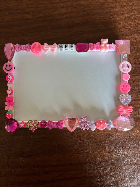 These picture frames can be personalized/customized with a name/word and you pick the charm color scheme of your choice!   The combinations are endless! Message me what main color scheme you want and i will tkae care of the rest! They're perfect for gifts or favors for your little one. Just think birthday parties, holidays, mommy & me or just because they're so cute! Generic Charm Picture Frames: $35.00 Personalized With Name Picture Frames: $40.00 Frames are 4x6 and can fit any word or name at the top! All picture frames are packaged in a clear cellophane baggie that's ready for gift giving and will be shipped in a bubble padded envelope.