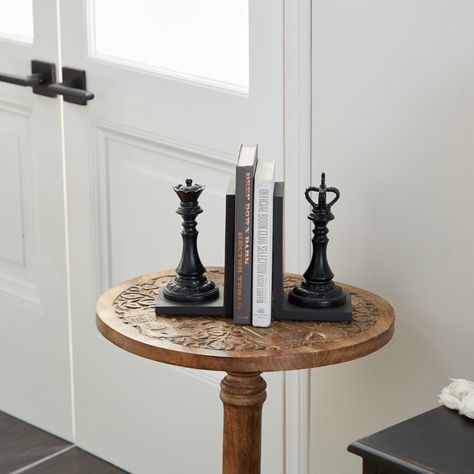 "Find the 8\" Black Chess Bookends, 2ct. at Michaels. com. Transform your rustic and traditional-inspired bookshelves at home and in your office with the addition of this King and Queen chess piece bookend pair! Transform your rustic and traditional-inspired bookshelves at home and in your office with the addition of this King and Queen chess piece bookend pair! This impressive home library/office décor set is made of polystone in a textured finish and L-shaped panels. Details: Black 5\" x 8\" 2 Unique Bookends, Queen Chess Piece, Law Office Decor, Chess Queen, Decorative Bookends, Chess Table, Study Area, Home Libraries, King And Queen