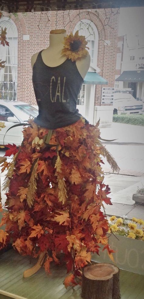 very creative way to turn a dress form into a fall display. This one is from Southern Girl boutique in South Carolina Fall Mannequin Display, Halloween Boutique Window Display, Maniquin Dress Display Ideas, Fall Windows Display, Fall Storefront Window Display, Fall Boutique Ideas, Fall Boutique Window Display, Fall Retail Window Displays, Fall Store Display Ideas