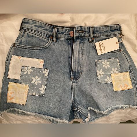 Billabong X Wrangler Women's High Rise Medium Wash Floral Showdown Patchwork Cut-Off Denim Shorts Cool Jean Shorts, Painting Denim Shorts, Jean Shorts With Patches, Patched Clothes, Clothing Flips, Custom Denim Shorts, Long Denim Shorts Outfit, Patchwork Jean Shorts, Artist Clothes