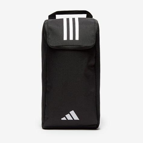 Take your trainers and boots on the go with the adidas Tiro League Shoe Bag in BlackWhite. Made for the beautiful game, the Tiro League boot bag has enough room to fit almost any kind of sports shoe, perfect for trainers, Astro turfs or football boots. Zip closure keeps them contained, so you dont need to worry about getting mud or water on your other gear, and mesh ventilation patches aid the natural drying process. The webbing carry strap makes for easy transport, and the 100 recycled polyeste Futsal Football, Adidas Shoe, Black And White Bags, Football Team Shirts, English Football League, Football Tournament, Team Bags, Classic Football Shirts, The Beautiful Game