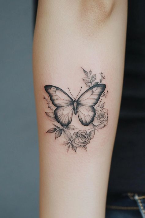 30 Captivating Butterfly Tattoo Design Ideas to Grace Your Arm – Refined Aesthetique Small Butterfly Tattoo On Thigh, Butterfly With Tulips Tattoo, Angel Wing And Butterfly Tattoo, Carnation Butterfly Tattoo, Butterfly Tattoo With Vines, Roses With Butterfly Tattoo, Butterfly Tattoos For Women Arm, Back Butterfly Tattoo Women, Butterfly Tattoo Chest Woman