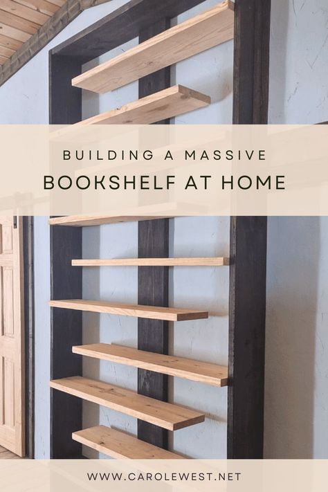 A year later and I still love this massive bookshelf my husband built as a focal point for our simple home.  It holds our books, video and games and even a few other odds and ends.  This is an easy project with simple steps if you are into DIY. Heavy Duty Bookshelves, Diy Staggered Bookshelf, Diy Wall Mount Bookshelves, Diy Forward Facing Bookshelf, Homemade Bookshelf Ideas, Cheap Diy Bookshelf, 2x4 Bookshelf Diy, Fyi Bookshelves, Unique Diy Bookshelves