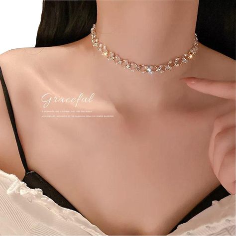 This fashion pearl choker necklace makes you more elegant, You can wear it everyday on any occasions as you like. It looks very eye-catching,make you more beautiful and charming. Perfect Gift: This necklace will be a special gift for friends, wife, daughter, mother, sister, perfect gift for Christmas, Graduation, Birthday, Thanksgiving day, Valentine's DayAnniversary, Graduated Day, Mother's day. Material:18K Gold Plated/High Quality Alloy/Crystal/Pearl Size13.0"+2.8"Extension Chain ColorGold We Kalung Choker, Birthday Necklace Gift, Sweet Necklace, Rhinestone Choker Necklace, Trendy Necklace, Classic Necklace, Rhinestone Choker, Pearl Choker Necklace, Jewelry Birthday