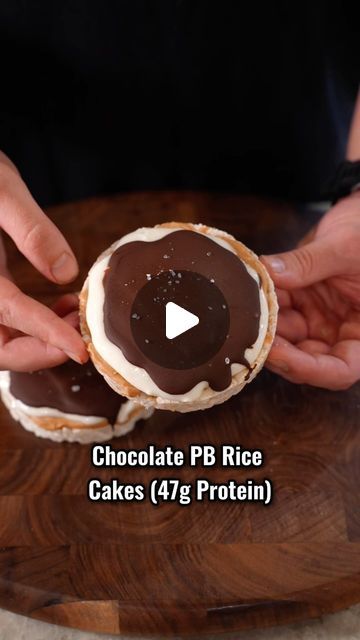 Justin Anderson on Instagram: "Chocolate Peanut Butter Rice Cakes (47g Protein Total). These taste phenomenal, super easy to make and are high protein. My new favorite protein dessert.

Ingredients:

2 plain rice cakes
2 tbsp peanut butter powder
2-3 tbsp water
1/2 tbsp peanut butter
1/2 cup plain Greek yogurt
1 scoop vanilla protein
1/2 tbsp honey
2 tbsp chocolate chips (melted)
Sea salt

-Place in fridge or freezer until the chocolate hardens 

#recipe#highprotein#dessert#proteindessert#gym#fitness#easyrecipes#weightloss#protein" High Protein Snack Recipes, Rice Cake Snacks, Protein Dessert, Butter Powder, Healthier Treats, Plain Rice, Rice Cake Recipes, Healthy High Protein Meals, High Protein Low Carb Recipes