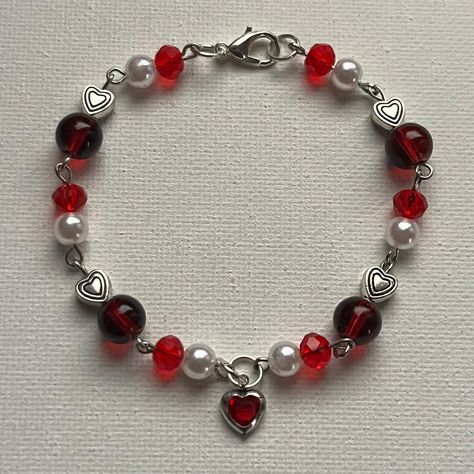 Selling on my instagram: norigazing #handmade #jewelry #bracelet #red #valentine #heart #heartcharm #white #beads #aesthetic #smallbusiness Heart Bracelet Handmade, Red Charm Bracelet, Handmade Red Charm Bracelet, Homemade Charm Bracelets, Red Beads Bracelet, Bracelet Ideas Words, Red Bracelet Ideas, Red Bracelet Diy, Heart Jewelry Diy