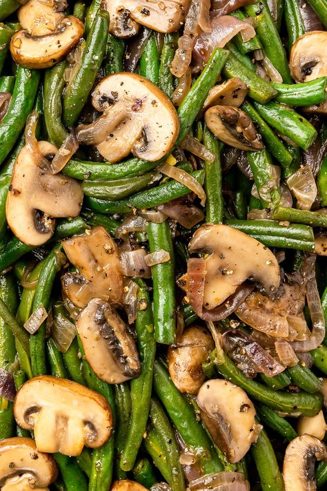 This Green Beans with Mushrooms recipe is an easy stove-top side dish with all the elements of a green bean casserole, but it doesn’t take up valuable oven space. #greenbeans #stringbeans #mushrooms #sidedish #thanksgivingside #healthyrecipes #weightwatchers Dinner Ideas With Fresh Green Beans, Vegetable Dinner Side Dishes, Green Bean Ideas Side Dishes, What To Make With Fresh Green Beans, Healthy Veg Side Dishes, Side Dish Mushrooms, Yummy Green Bean Recipe, Side Of Green Beans, Veggies On The Stove Top