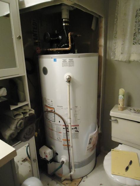 'Sliding Wall Panels' for Around Hot Water Heater : 4 Steps - Instructables Hot Water Heater Hide, Hide Water Heater, Water Heater Cover, Water Heater Closet, Knick Knack Shelf, Small Laundry Room Makeover, Water Heater Repair, Sliding Wall, Hot Water Tank