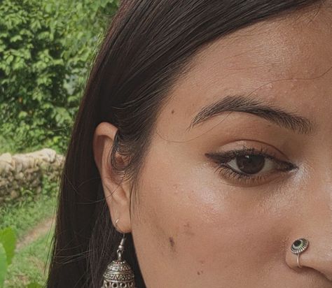 Desi aesthetic, black bindi, jhumka, oxidised jhumka, nosering, kajal, desi dark feminine, eye makeup Desi Dark Feminine Aesthetic, Kajal Eyes Aesthetic, Kajal Aesthetic, Dark Feminine Eye Makeup, Feminine Eye Makeup, Kajal Eyes, Oxidised Jhumka, Beautiful Eyes Color, Eyes Color