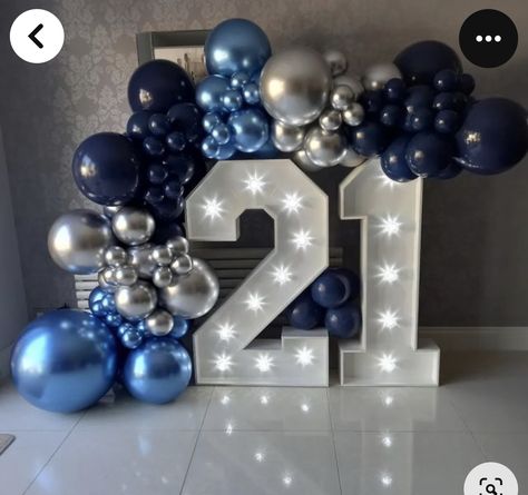 Blue Balloon Garlands, 21 Light Up Numbers With Balloons, 21 Balloon Garland, Led Numbers With Balloons, Navy Blue And Silver Birthday Cake, Blue And Silver Backdrop Ideas, 21st Birthday Backdrop Ideas For Guys, Blue 21st Birthday Decorations, Balloon Garland With Numbers