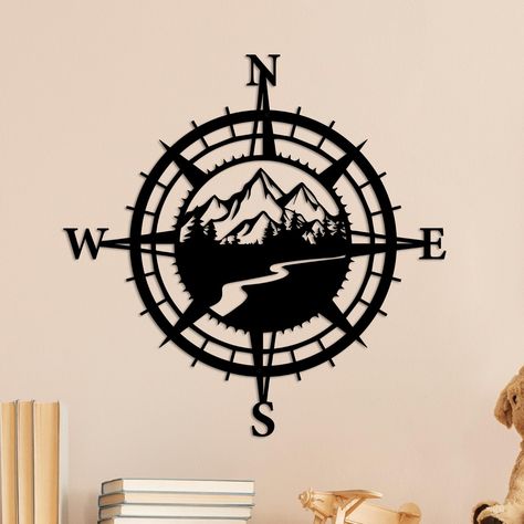 PRICES MAY VARY. EXQUISITE DESIGN: Resama compass adopts a simple and rustic precision-cut hollow design, which has a 3D visual sense from a distance on a light background. WIDE APPLICATION: Ideal for people who are willing to add a fun nautical or unique feel to their home. Nautical compass decoration is suitable for decorating the wall of living Room, Bedroom, corridors, Kitchen, bathroom or Office. It is also the perfect choice for farmhouse wall art. HIGH QUALITY: Made of 100% high quality i Compass Decoration, Hiking Decor, Compass Wall Art, Outdoor Wall Hanging, Compass Wall Decor, Vintage Compass, Nautical Compass, Theme Wall, 3d Visual