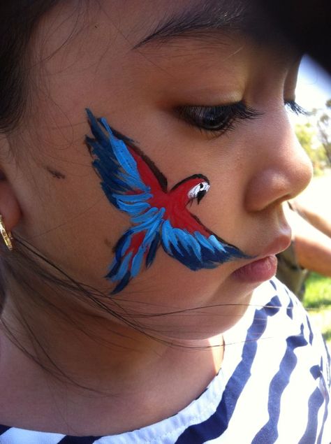 Parrot Face Painting, Halloween Cheek Face Paint, Jungle Face Paint, Face Painting Easy Simple, Tropical Face Paint, Animal Face Paint Ideas For Kids, Face Painting Animals, Parrot Face Paint, Bird Face Painting