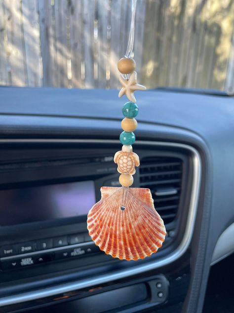 Beachy car charm freshener , seashell rear view mirror car charm, rear view mirror beach decor car accessories #CarMods Clay Car Charms Rear View Mirror, Seashell Keychain Diy, Car Charms Diy, Beachy Car, Seashells Embroidery Designs, Canvas Painting Patterns, Seashell Keychain, Bus Ideas, Car Charms Rear View Mirror