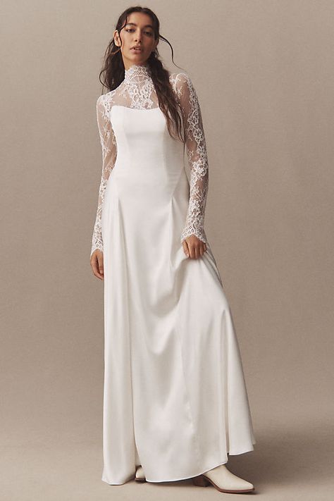 The Watters Long-Sleeve Lace Bodysuit, crafted with intricate lace and flattering details, serves as an elegant layering piece beneath a dress, adding versatility to your ensemble. | Long-Sleeve Lace Bodysuit by Watters in White, Women's, Size: 2, Polyester/Nylon/Elastane at Anthropologie Lace Under Wedding Dress, Non Traditional Wedding Dress With Sleeves, Fall Wedding Dress Long Sleeve, Winter Courthouse Wedding Dress, Classic Long Sleeve Wedding Dress, Winter Wedding Dress Coverups, Jewish Wedding Dress, Long Sleeve Winter Wedding Dress, Frida Wedding