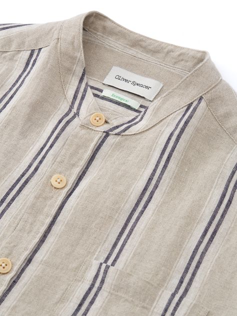 Born of utilitarian origins, the grandad collar has become a workwear classic, dressing down the archetypal men's shirt to something altogether more relaxed. This version has been cut in 100% linen and features two-tone vertical stripes for a relaxed of-duty summer shirt that's a breeze to style with our linen trousers and tailored shorts.