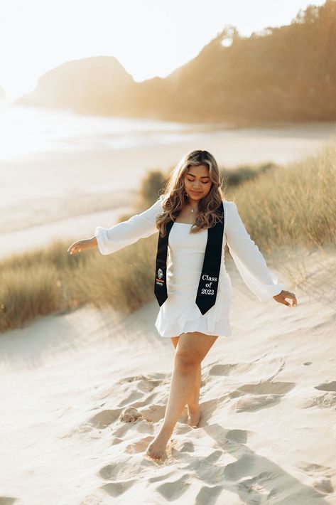 Graduating from the University of Oregon is such an incredible milestone and your graduation pictures are such a special way of celebrating that milestone! My favorite kind of grad photos are the ones where we get creative together and photograph you in an element that genuinely shows off who you are! For Sokcali, that meant doing her session at the coast at Cannon Beach! University Of Oregon Graduation, Beach Graduation Pictures, Graduation Shoot Ideas, Pictures At The Beach, Cap And Gown Photos, Sorority Poses, Graduation Pic Ideas, Cap And Gown Pictures, College Graduation Photos