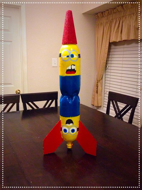 Minion bottle rocket Bottle Rocket Ideas, 2 Liter Bottle Rocket Designs, Bottle Rocket Designs, Diy Bottle Rocket, Rocket Decorations, Rocket Craft, Water Rocket, Diy Rocket, Bottle Rocket