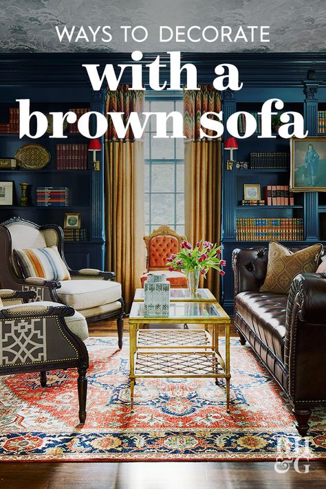 Get inspiration on how to style a brown sofa so that your living room stays fresh and modern. #decorideas #livingroomdecor #brownsofa #bhg Dark Brown Sofa Living Room, Brown Leather Sofa Living Room, Dark Brown Leather Sofa, Chesterfield Sofa Living Room, Brown Leather Couch Living Room, Dark Furniture Living Room, Dark Brown Sofas, Brown And Blue Living Room, Brown Sofa Living Room