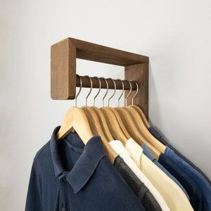 Diy For Hanging Clothes, Wooden Hanger Rack, Diy Shirt Rack, Wall Mounted Luggage Rack, Wall Mounted Clothes Hanger, Diy Hanger Rack, Wall Mounted Clothes Rail, Hanging Jackets Ideas, Shirt Hanging Ideas