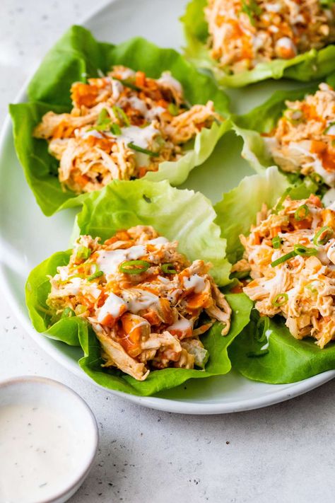 This easy-to-make buffalo chicken salad is packed with fresh veggies, lean protein and simple toppings like blue cheese. Buffalo Chicken Salad Wrap, Buffalo Chicken Lettuce Boats, Low Carb Buffalo Chicken Wraps, Buffalo Chicken Healthy Recipes, Buffalo Chicken Salad Healthy, Buffalo Chicken Healthy, Healthy Salad With Chicken, Healthy Buffalo Chicken Salad, Buffalo Chicken Salad Recipe