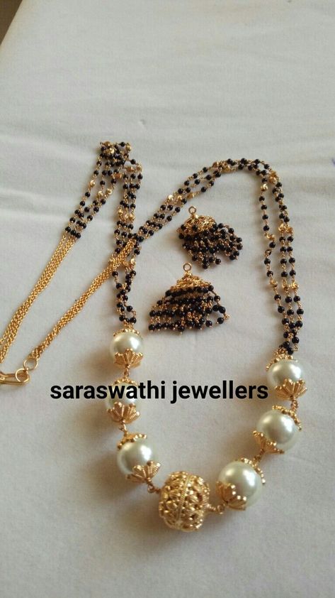 Gold Pearl Jewelry, Black Beads Mangalsutra, Black Beads Mangalsutra Design, Pearl Jewelry Design, Gold Jewelry Simple Necklace, Gold Mangalsutra Designs, Pearl Necklace Designs, Black Beaded Jewelry, Wedding Jewellery Collection