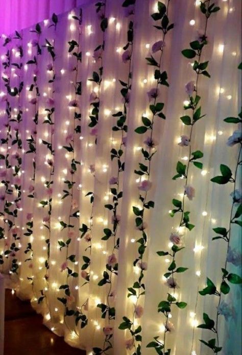 Curtain Lights With Flowers, Flower Vines Backdrop, Vines With Flowers Room Decor, Flowers And Lights Decor, Diy Quinceanera Backdrop, Flowers Hanging From Ceiling Bedroom Diy, Flower Back Drops For Parties, Ethereal Party Decor, Aesthetic Ganpati Decoration