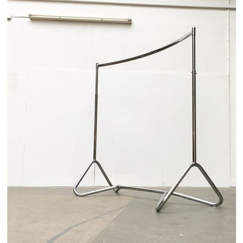 Rare mid century tubular steel coat rack by bremshey & co, solingen.  a timeless and functional design made of tubular steel. The whole stand is a slight arc. The lower rack consists of several elements, but looks like one continuous tube. The tube forms elegant loops towards the bottom. The actual clothes rail can be adjusted in height in 10 cm increments and fixed with a cotter pin. the wardrobe is in very good condition with traces of use.  dimensions: h: 124-164 cm, w: 150 cm, d: approx. 75. Steel Tube Ideas, Vintage Clothing Rack, Metal Clothing Rack, House Shopping List, Retail Clothing Racks, Metal Coat Rack, Jewelry Display Stands, Metal Clothing, Clothes Rail