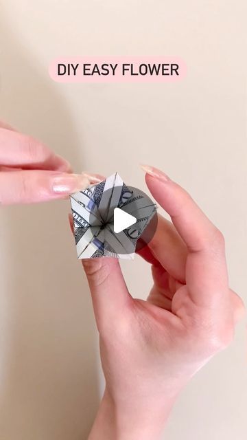 Valentina Balance on Instagram: "How fold a money flower #diy #origami #giftideas" Folding Dollars Into Flowers, Floral Money Bouquet, Fun Ways To Fold Money, Dollar Origami Flower, How To Make A Money Flower, Money Origami Tutorial Step By Step, Folding Money Into Flowers, Money Origami Diy, Money Oragami Ideas