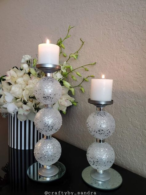 I took Christmas ornaments and turned them into these glam candle holders. In the link, you can see how I did it: https://www.instagram.com/reel/CzBgWehrpRV/?igshid=MzRlODBiNWFlZA== Candle Stand Diy, Glam Candles, Candle Holder Crafts, Deco Table Noel, Christmas Centerpieces Diy, Dollar Tree Christmas, Diy Dollar Tree Decor, Diy Candle Holders, Christmas Candle Holders