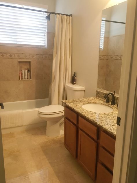 Bathroom Flooring With Oak Cabinets, Travertine And White Bathroom, Travertine Tile Bathroom Ideas, Tan Tile Master Bath, Bathroom Ideas Tan Tile, Bathroom Paint Colors With Brown Tile, Travertine Shower Ideas, Bathroom With Travertine Floors, Bathroom Ideas Brown Tile